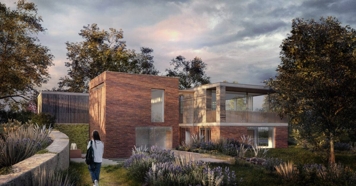 Gresford Architects Ltd — Contemporary brick house with a two-storey form, large windows and a timber deck, set in a landscaped garden. Architecture by Gresford Architects.